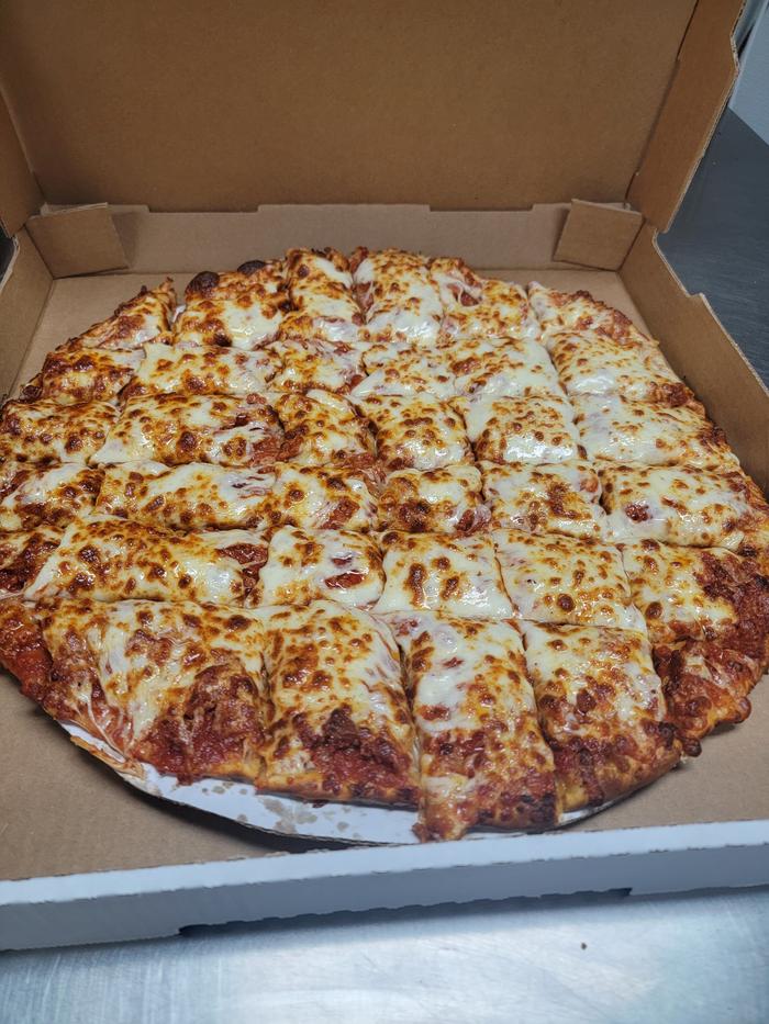 Pizza King medium pepperoni pizza fresh from the oven